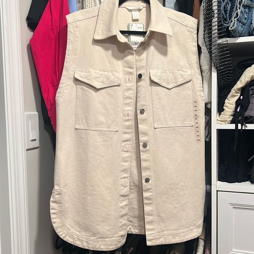Brand new beige vest - tags on